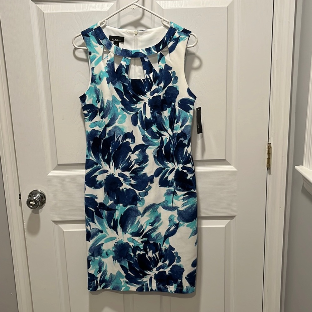 New!  Cute floral dress with cutout neckline!